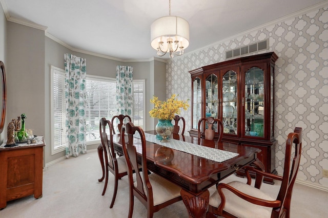 304 Reavley Dr, Lamar, MO 64759 - dining room with a notable chandelier, visible vents, light carpet, and wallpapered walls