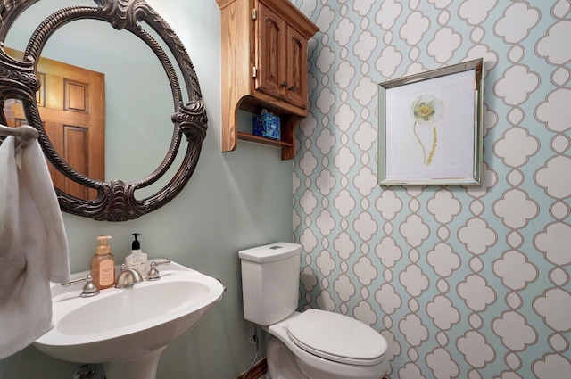 304 Reavley Dr, Lamar, MO 64759 - half bath featuring toilet and a sink