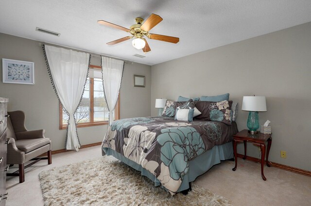 304 Reavley Dr, Lamar, MO 64759 - bedroom featuring visible vents, baseboards, light colored carpet, and ceiling fan