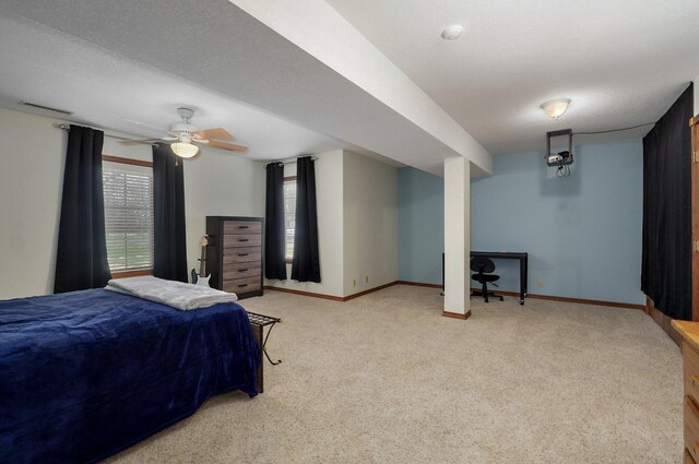 304 Reavley Dr, Lamar, MO 64759 - bedroom featuring visible vents, carpet floors, a textured ceiling, and baseboards