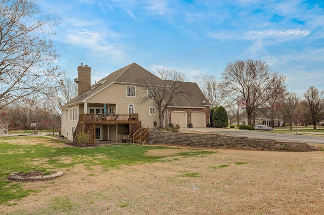 304 Reavley Dr, Lamar, MO 64759 - exterior space featuring stairway, a yard, concrete driveway, an attached garage, and a chimney