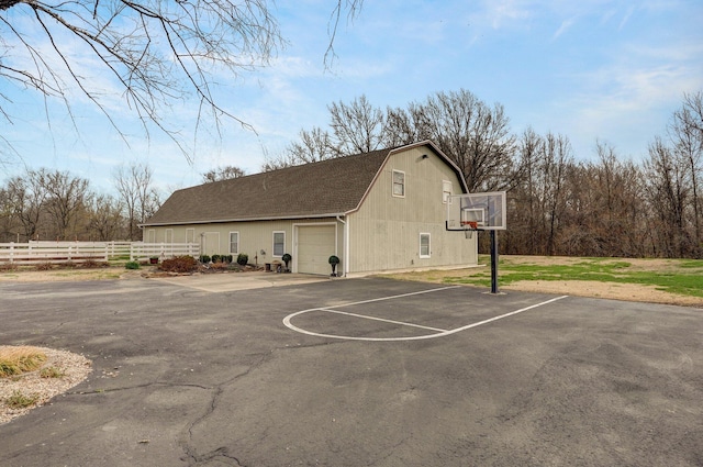 304 Reavley Dr, Lamar, MO 64759 - view of basketball court featuring fence