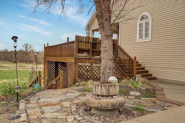 304 Reavley Dr, Lamar, MO 64759 - view of patio featuring stairway