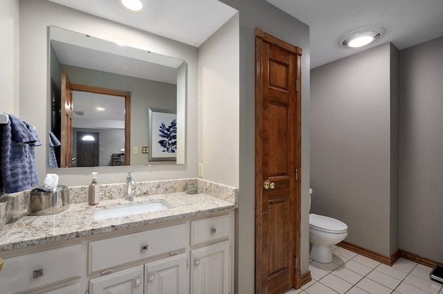 304 Reavley Dr, Lamar, MO 64759 - bathroom featuring tile patterned flooring, toilet, vanity, and baseboards