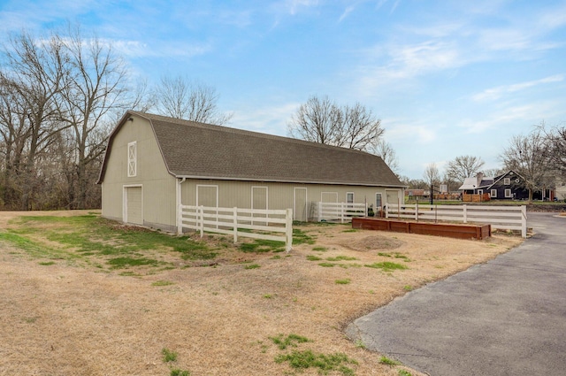 304 Reavley Dr, Lamar, MO 64759 - view of barn featuring fence