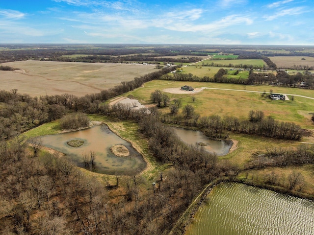 304 Reavley Dr, Lamar, MO 64759 - drone / aerial view featuring a water view and a rural view