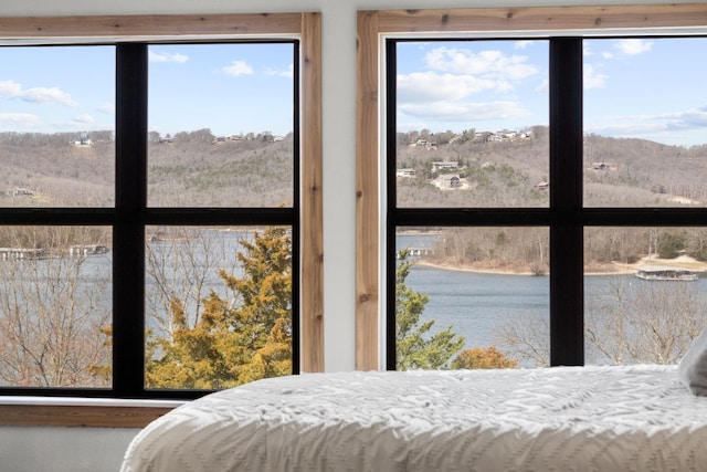 bedroom with a water view