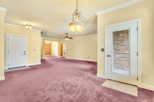 interior space with crown molding, carpet flooring, and baseboards