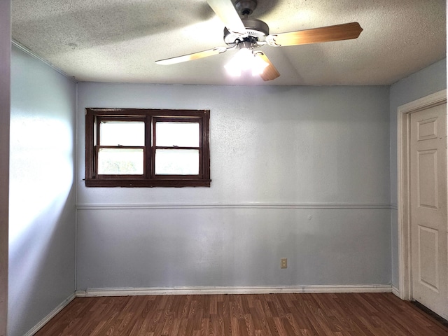 1622 W Fairview Ave, Carthage, MO 64836 - empty room with baseboards, wood finished floors, a textured ceiling, and a ceiling fan