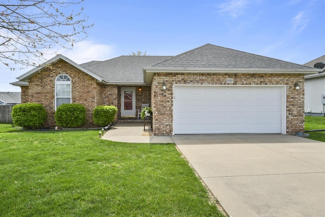 ranch-style house featuring a front yard, brick siding, driveway, and a shingled roof