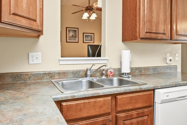 kitchen with white dishwasher, a sink, light countertops, a ceiling fan, and brown cabinets