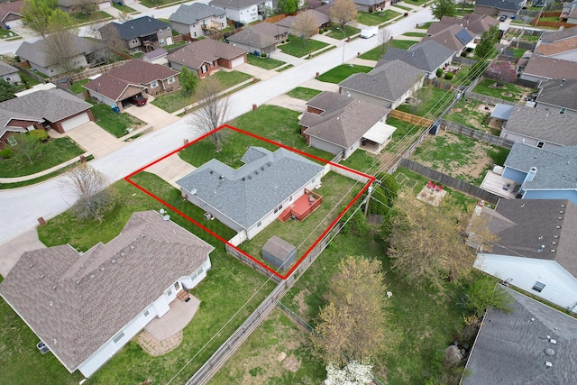 birds eye view of property with a residential view