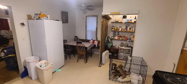 dining space featuring a ceiling fan