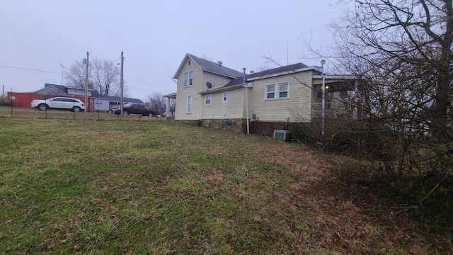 view of property exterior featuring a yard