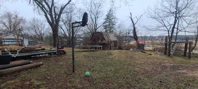 view of yard with a trampoline