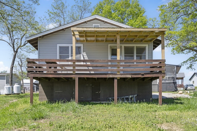 back of property with a deck