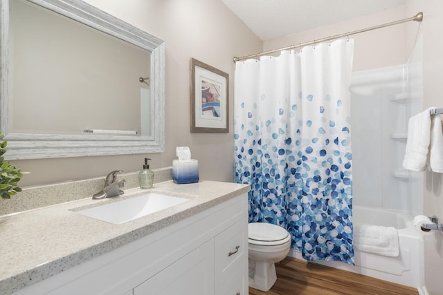145 Starboard Dr Unit 8, Kimberling City, MO 65686 - bathroom with toilet, vanity, wood finished floors, and shower / tub combo with curtain