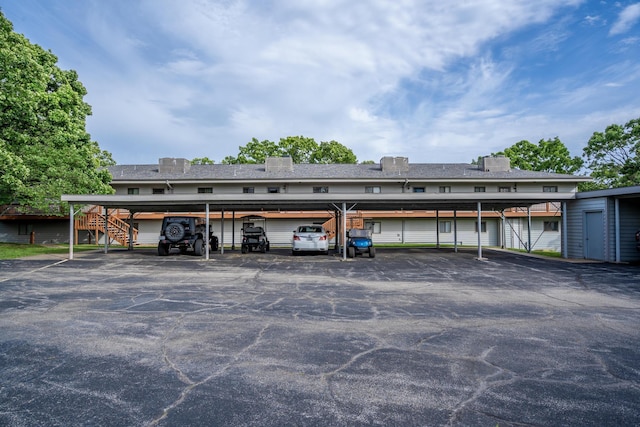 145 Starboard Dr Unit 8, Kimberling City, MO 65686 - covered parking lot with stairway
