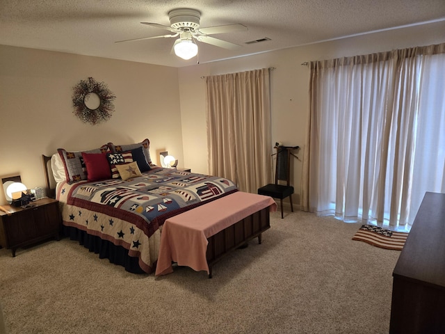 300 Port Dr Unit 5, Kimberling City, MO 65686 - bedroom featuring light carpet, visible vents, a ceiling fan, and a textured ceiling
