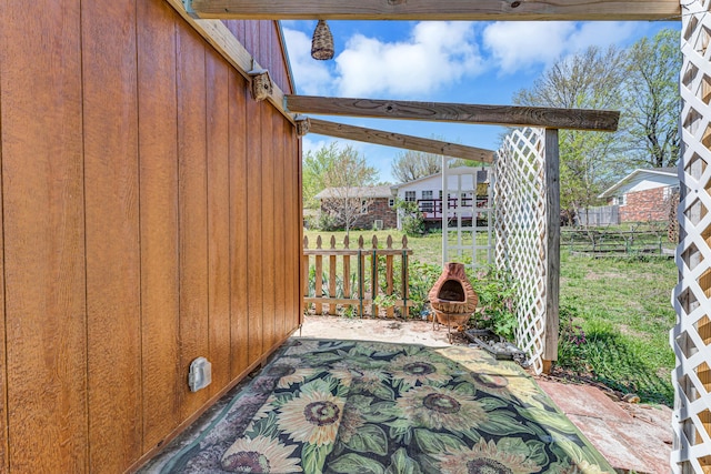 view of patio with fence