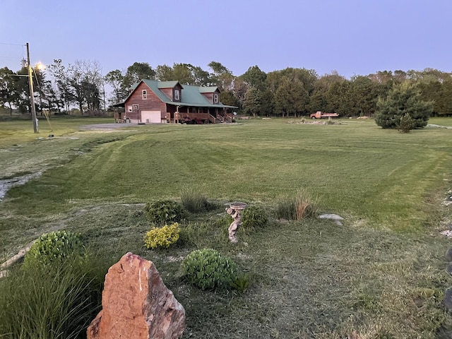 20302 Farm Rd Unit 1120, Cassville, MO 65625 - view of grassy yard featuring a garage