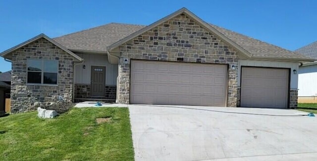 658 W Pinewood St, Nixa, MO 65714 - view of front of property with an attached garage and stone siding