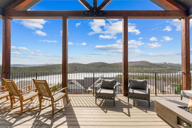 deck featuring a water and mountain view