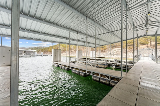 view of dock with a water view