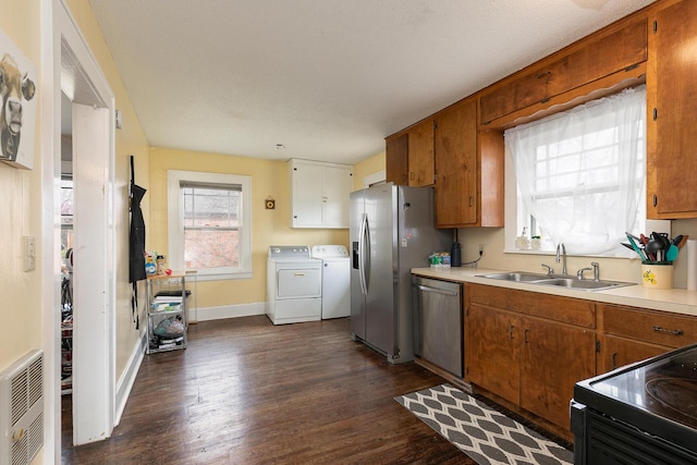 218 Lillian Pl, Bolivar, MO 65613 - kitchen featuring stainless steel refrigerator with ice dispenser, electric range, a sink, dishwashing machine, and washer and dryer