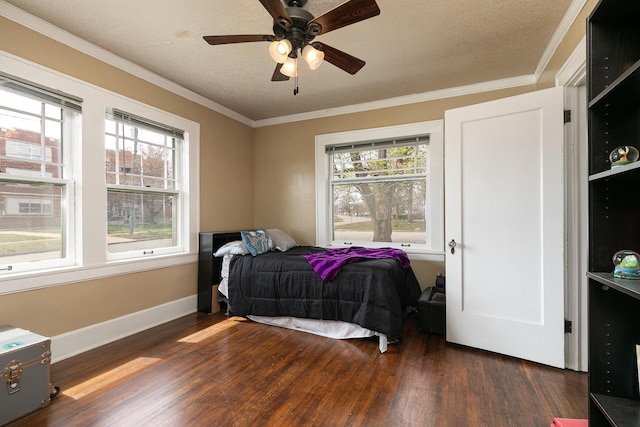 218 Lillian Pl, Bolivar, MO 65613 - bedroom featuring baseboards, ornamental molding, wood finished floors, and multiple windows