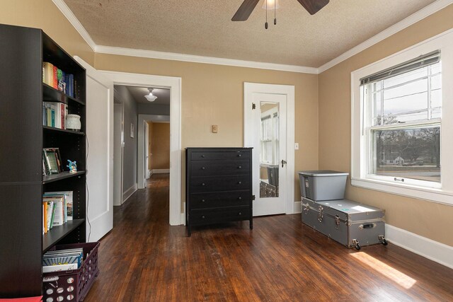 218 Lillian Pl, Bolivar, MO 65613 - interior space featuring wood finished floors, ceiling fan, ornamental molding, and a textured ceiling