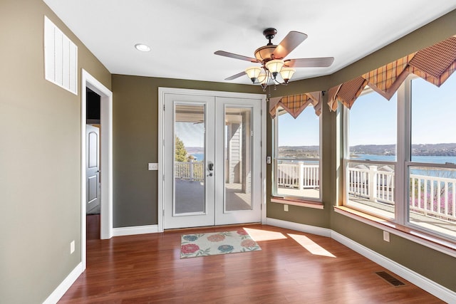 interior space featuring visible vents and french doors