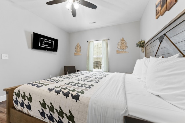 201-217 Watersound Way, Hollister, MO 65672 - bedroom featuring a ceiling fan, visible vents, baseboards, and wood finished floors