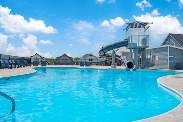 201-217 Watersound Way, Hollister, MO 65672 - pool featuring fence, a water slide, and a patio area