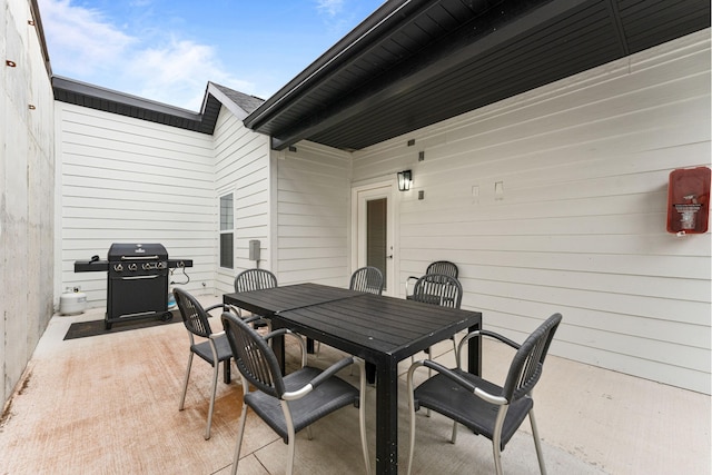 201-217 Watersound Way, Hollister, MO 65672 - view of patio featuring outdoor dining area and area for grilling