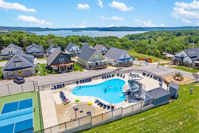 201-217 Watersound Way, Hollister, MO 65672 - drone / aerial view featuring a water view and a view of trees