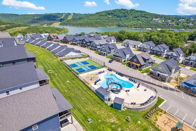 201-217 Watersound Way, Hollister, MO 65672 - birds eye view of property featuring a residential view and a water view