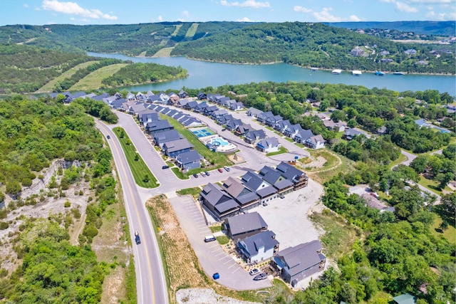 201-217 Watersound Way, Hollister, MO 65672 - drone / aerial view with a residential view, a water view, and a forest view