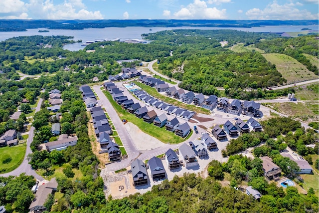 201-217 Watersound Way, Hollister, MO 65672 - bird's eye view with a water view, a view of trees, and a residential view