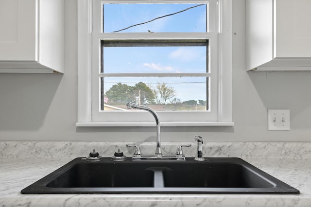 200 N Madison Ave, Mansfield, MO 65704 - interior details featuring white cabinetry and a sink