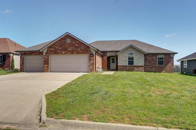 1471 Woodland Rd, Marshfield, MO 65706 - view of front of home with a garage, driveway, a front yard, roof with shingles, and brick siding