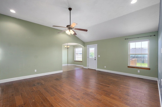 1471 Woodland Rd, Marshfield, MO 65706 - unfurnished room with a ceiling fan, wood finished floors, vaulted ceiling, recessed lighting, and arched walkways