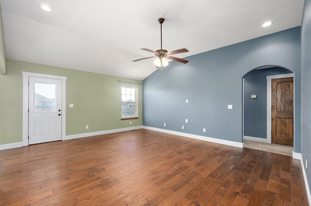 1471 Woodland Rd, Marshfield, MO 65706 - unfurnished room featuring arched walkways, a ceiling fan, wood finished floors, vaulted ceiling, and recessed lighting