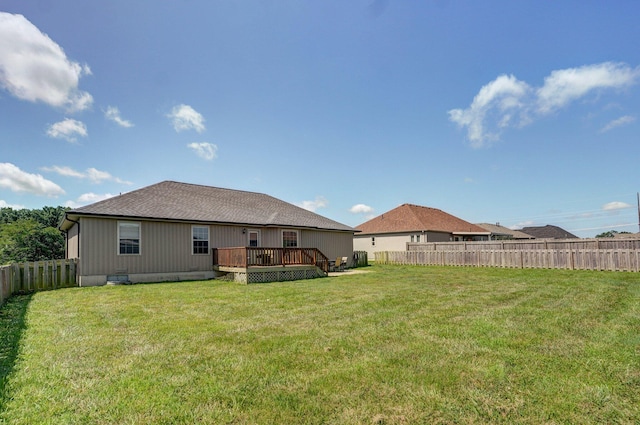 1471 Woodland Rd, Marshfield, MO 65706 - rear view of property with a deck and a fenced backyard