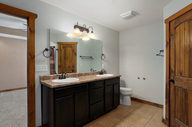 1471 Woodland Rd, Marshfield, MO 65706 - bathroom featuring double vanity and tile patterned floors