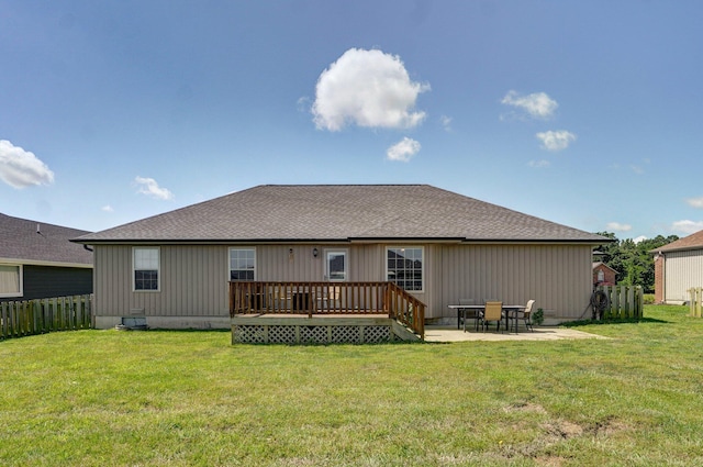 1471 Woodland Rd, Marshfield, MO 65706 - back of house with a wooden deck, a shingled roof, and a patio