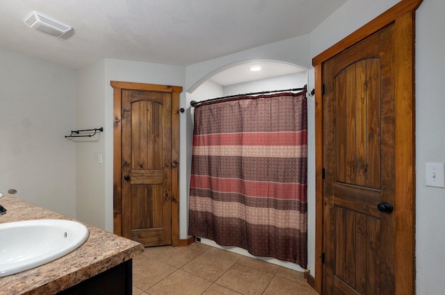 1471 Woodland Rd, Marshfield, MO 65706 - bathroom with tile patterned flooring, vanity, and a shower with shower curtain