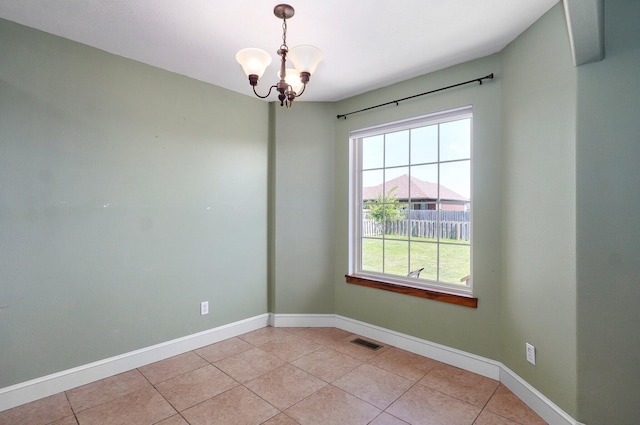 1471 Woodland Rd, Marshfield, MO 65706 - empty room featuring a chandelier and light tile patterned flooring
