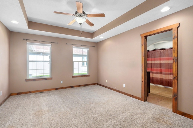 1471 Woodland Rd, Marshfield, MO 65706 - unfurnished room with carpet, a ceiling fan, recessed lighting, and a raised ceiling