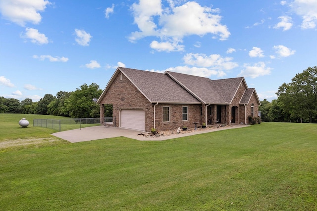 5651 State Highway 125 S, Sparta, MO 65753 - view of front of house featuring a garage, brick siding, driveway, and roof with shingles